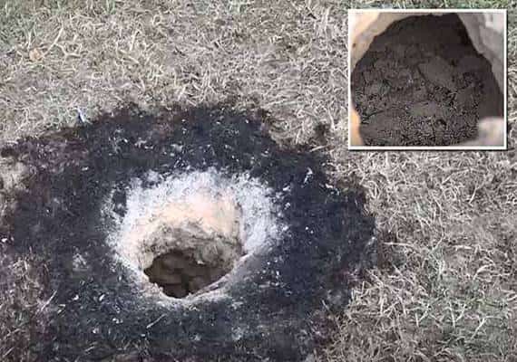 "לא מהחלל ולא השטן": מה או מי גרם לאש לפרוץ מתוך האדמה בארקנסו?