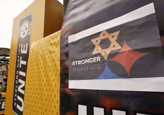 "חזקים משנאה": מחווה מרגשת של קבוצת ה-NFL לנרצחי הפיגוע