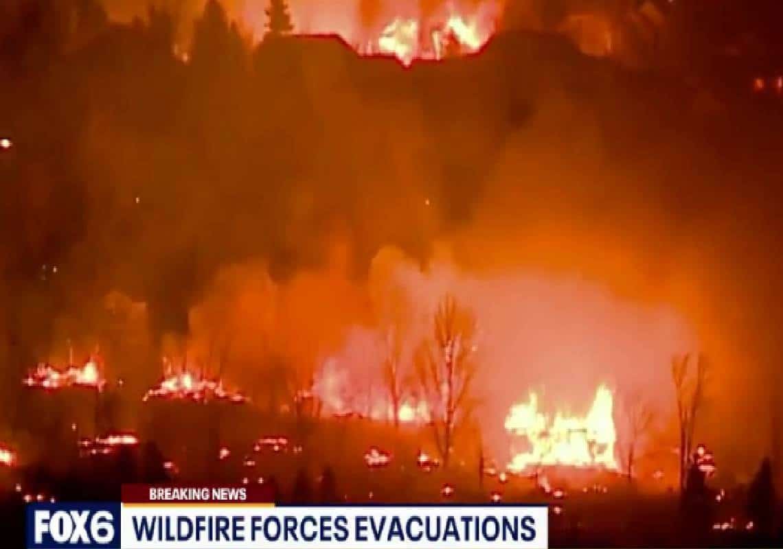 אפוקליפסה בקולורדו: 30,000 איש פונו, מאות בתים נשרפו - ואם זה לא היה די - סופת הוריקן ליבתה את האש